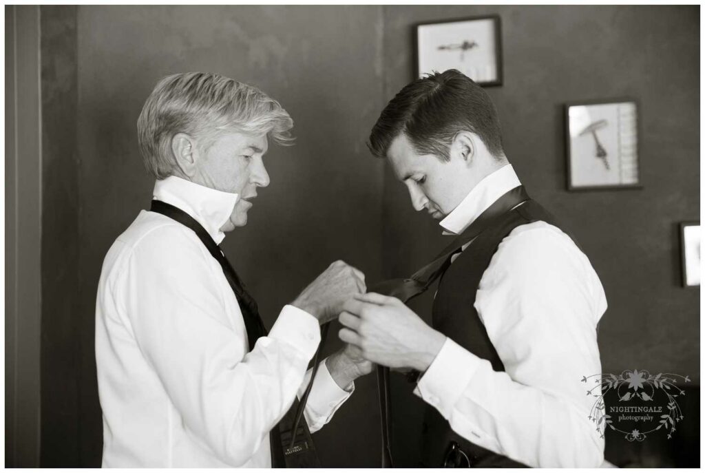 groom and his father get ready for wedding