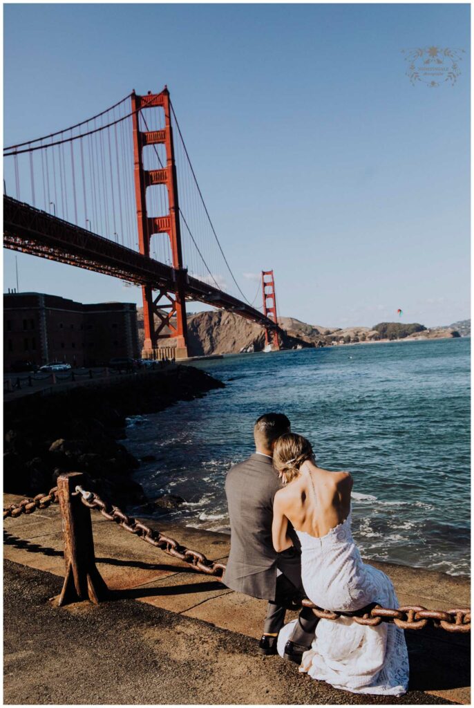 Wedding portraits with the Golden Gate Bridge after San Francisco Cliff House wedding 