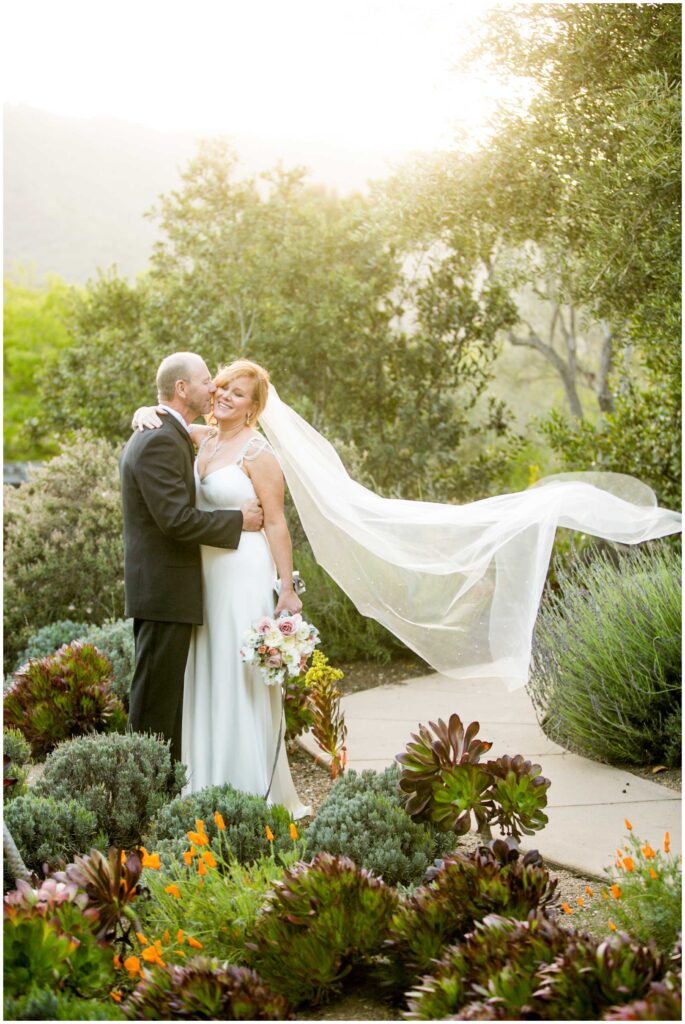 gorgeous wedding photo of couple in the garden at Bernardus Lodge outdoor venue in Carmel Valley< california