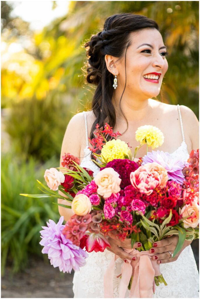 gorgeous latina bride with festive bouquet at her wedding at rancho dos pueblos in goleta near santa barbara