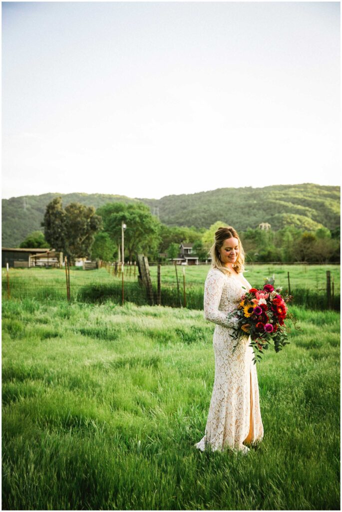 gorgeous bride has portraits in her rustic backyard