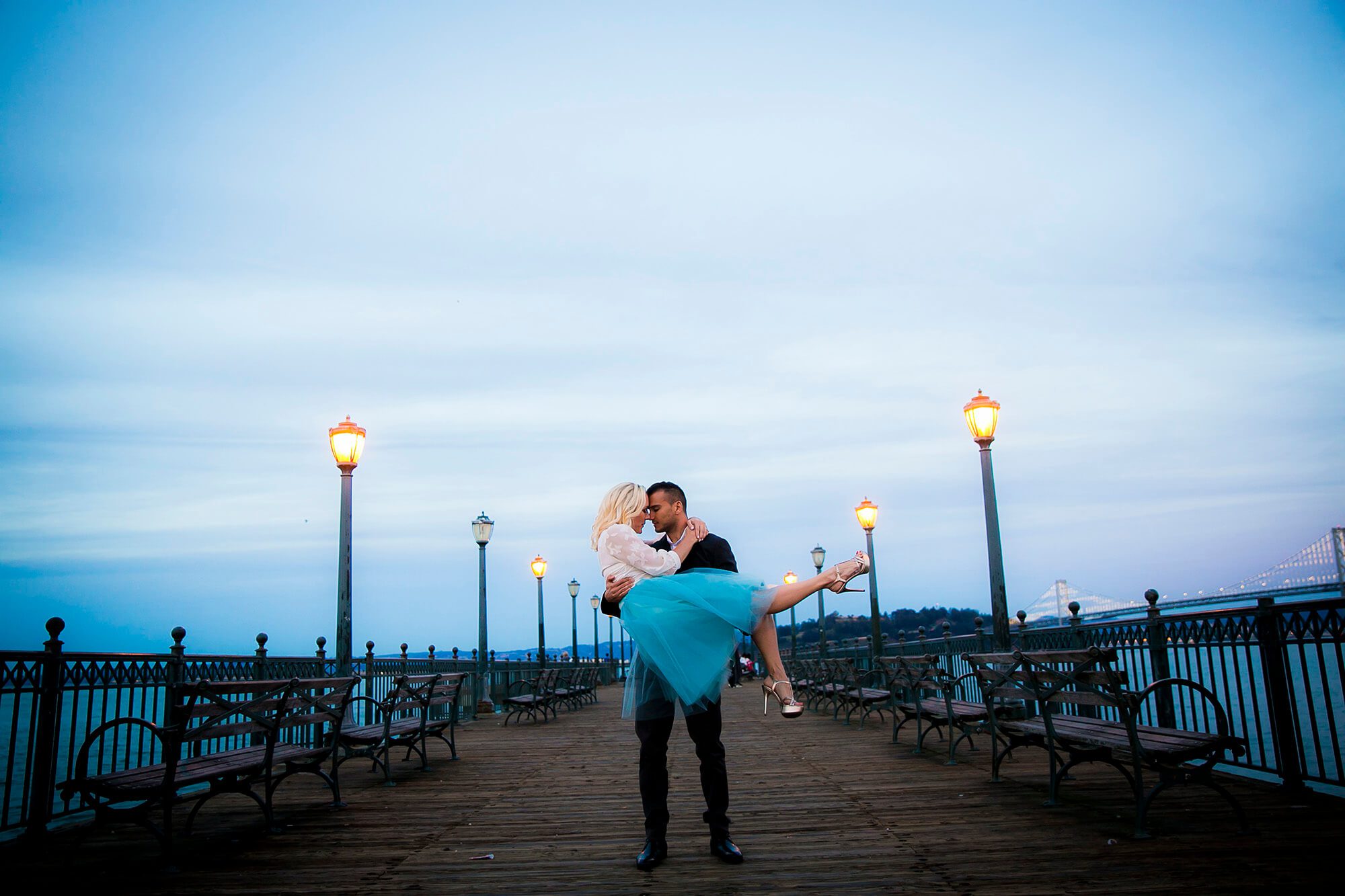 bay area engagement photographer - couple on pier in SF